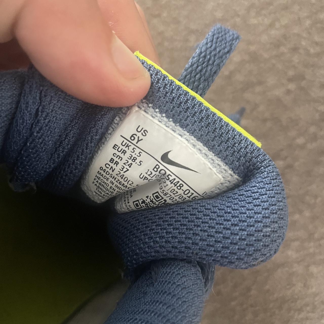 green blue and white nike shoes