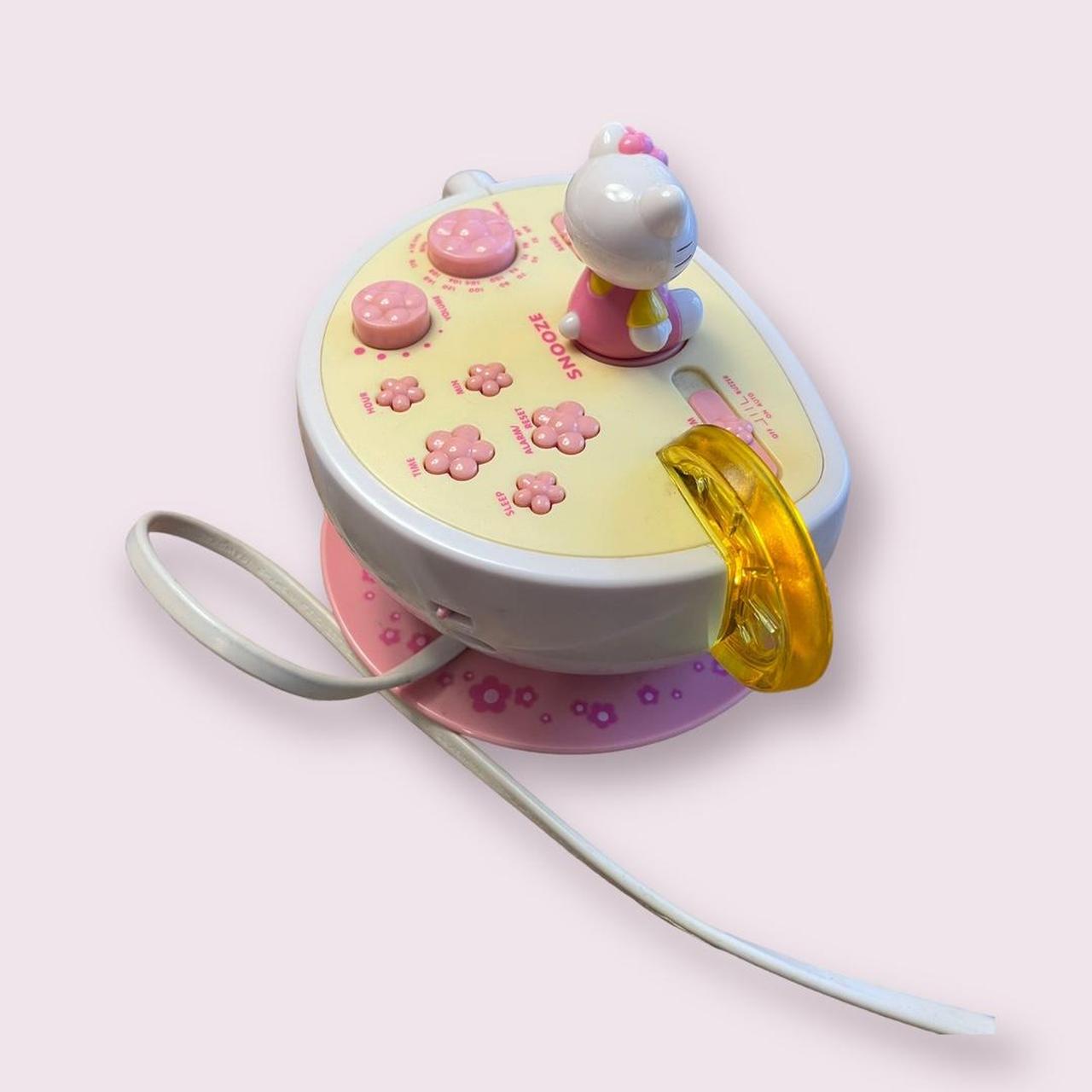 hello kitty teacup light up alarm radio good used... Depop