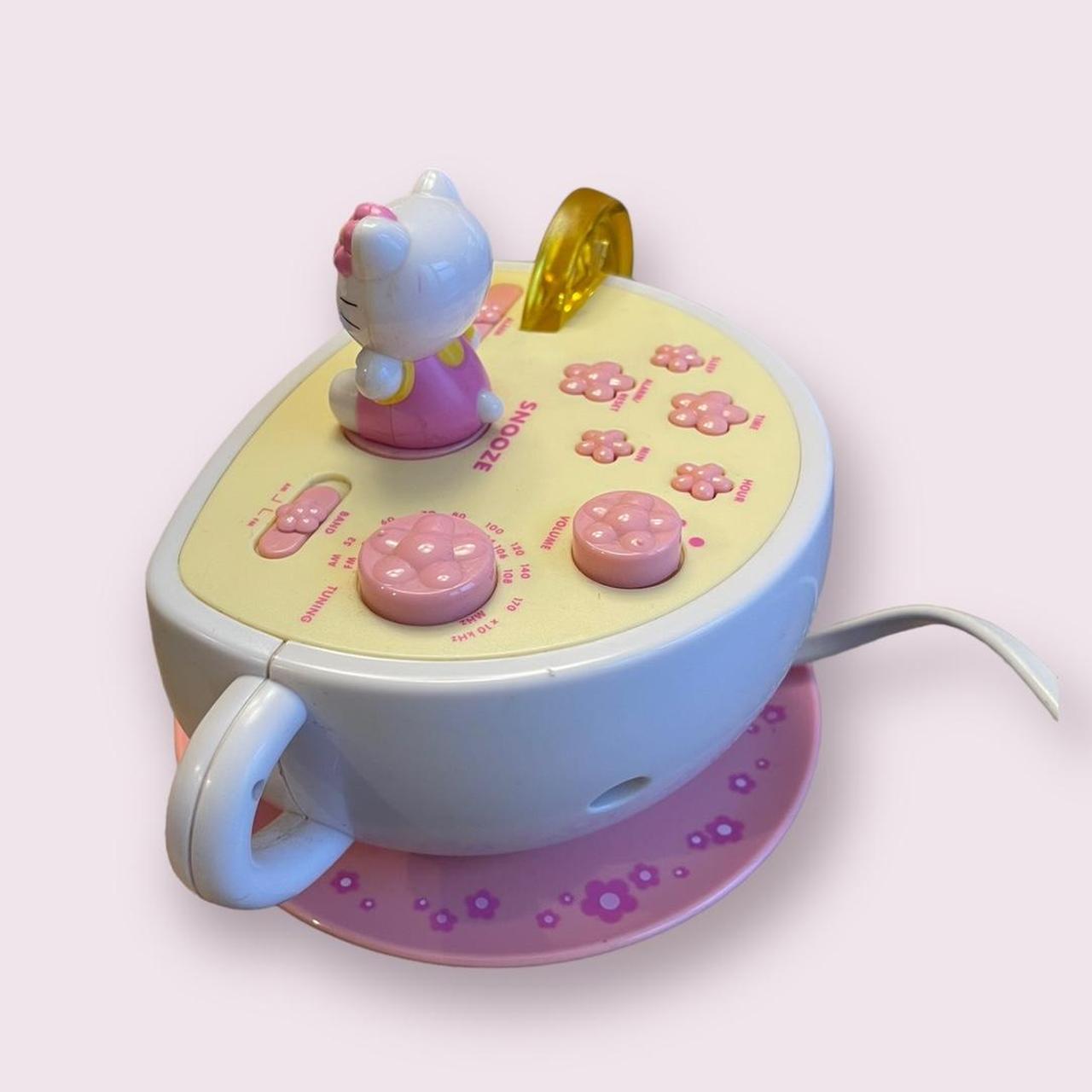 hello kitty teacup light up alarm radio good used... Depop