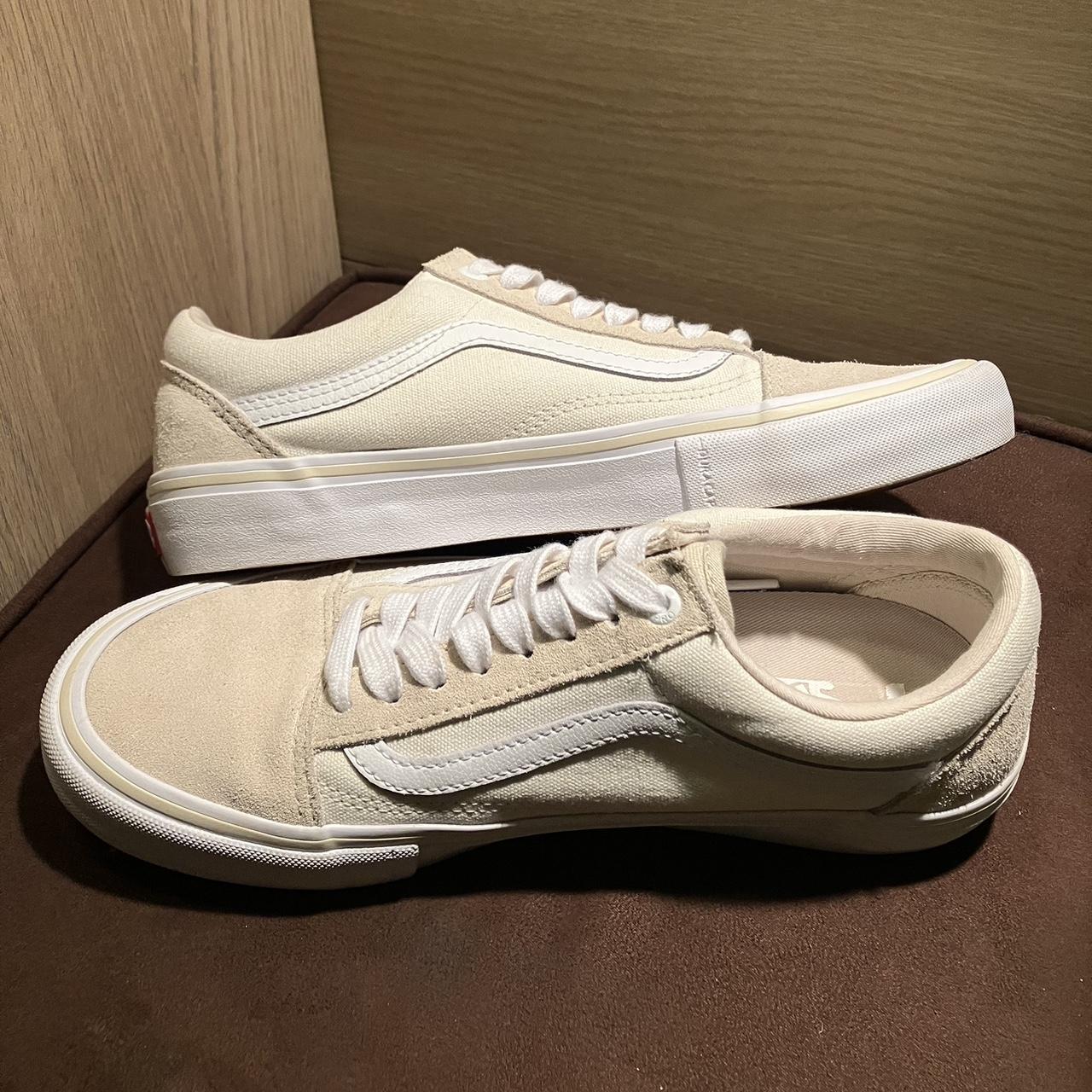 Vans in beige, cream and white canvas and