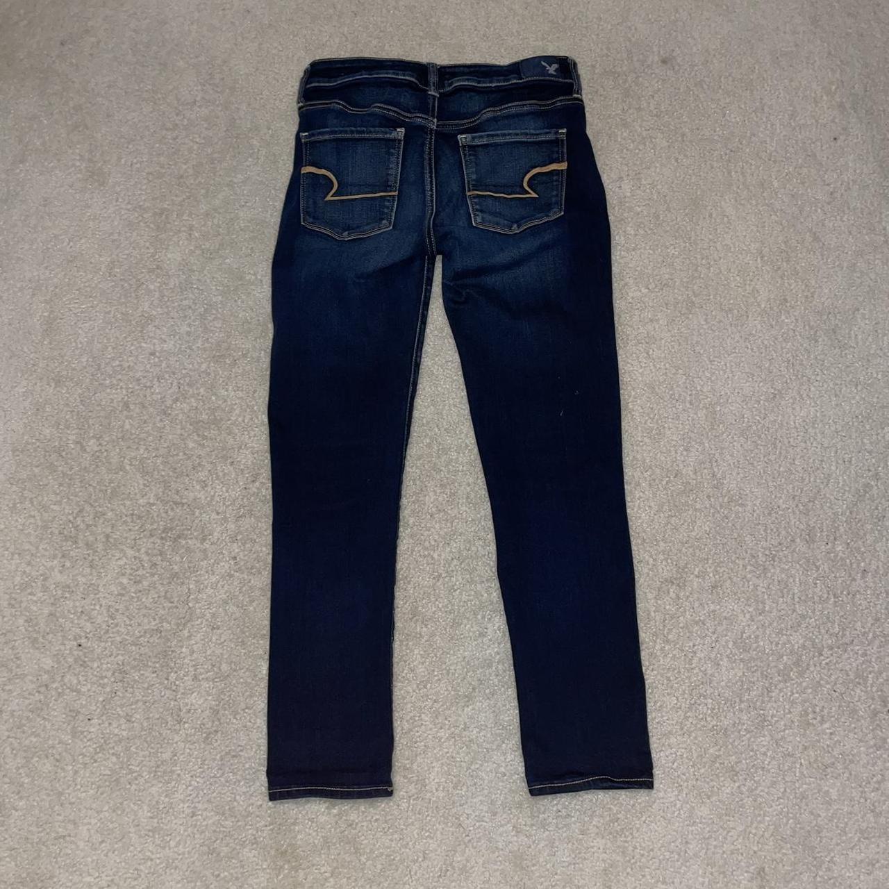 american eagle skinny jeans dark wash small snags on - Depop