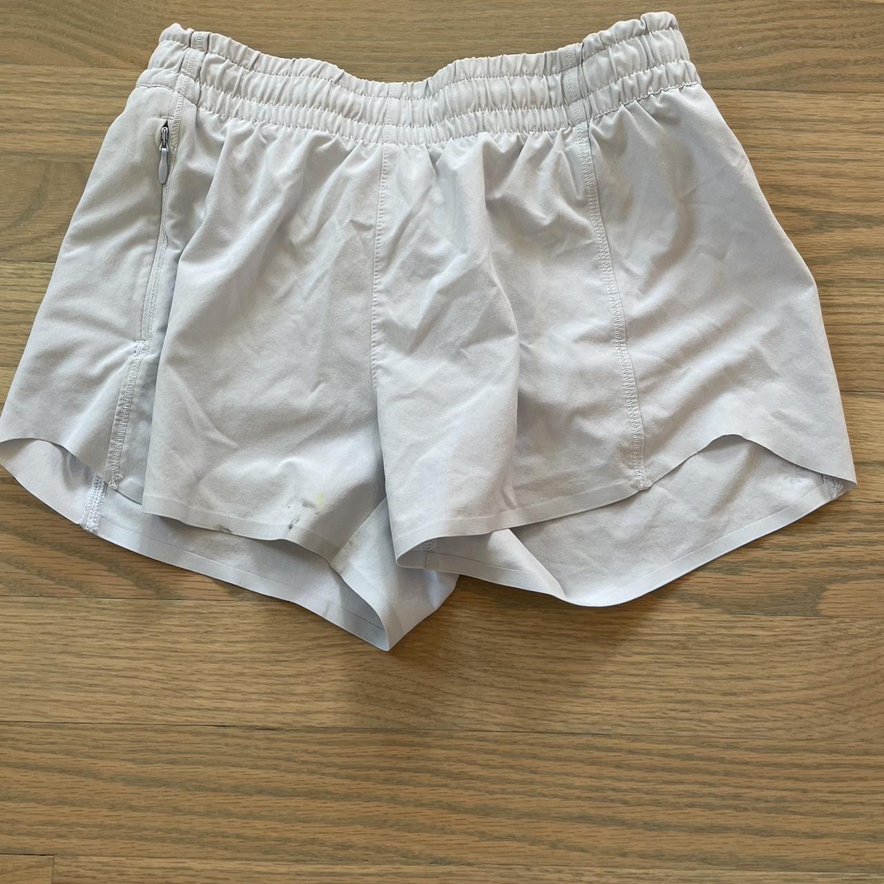 Light purple shorts with small stain, shown in the... - Depop