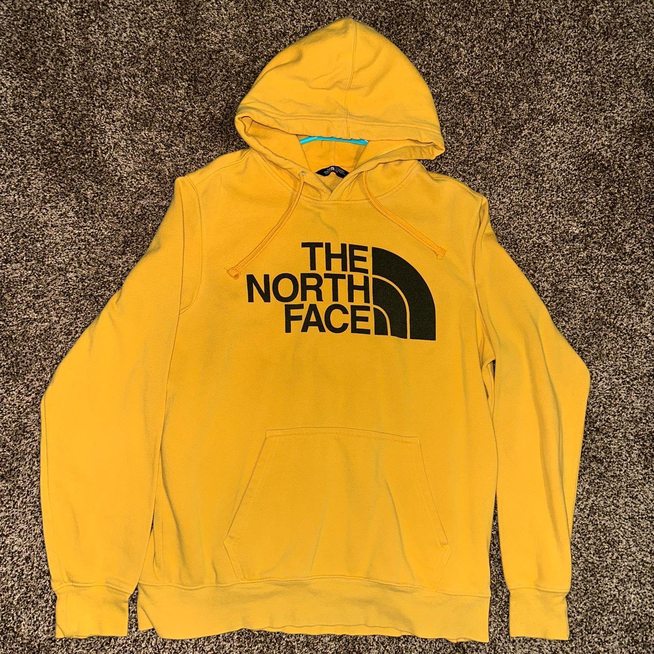 Yellow and black The North Face hoodie logo... - Depop