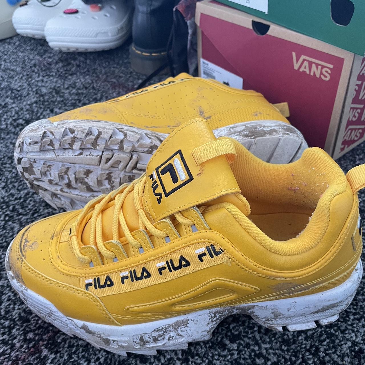 orange and yellow fila shoes