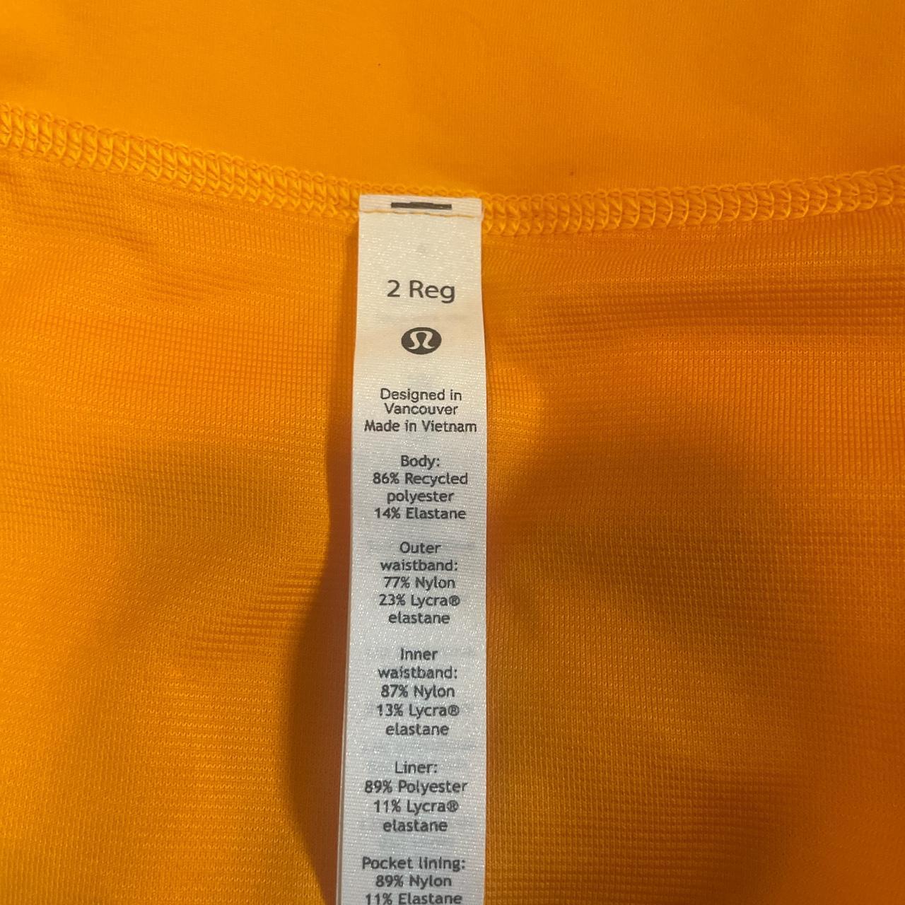 lululemon orange speed up shorts size 2 there are... - Depop