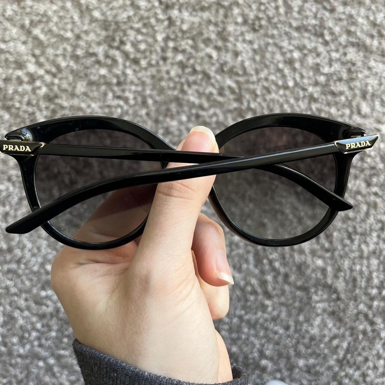 Prada Women's Black Sunglasses | Depop