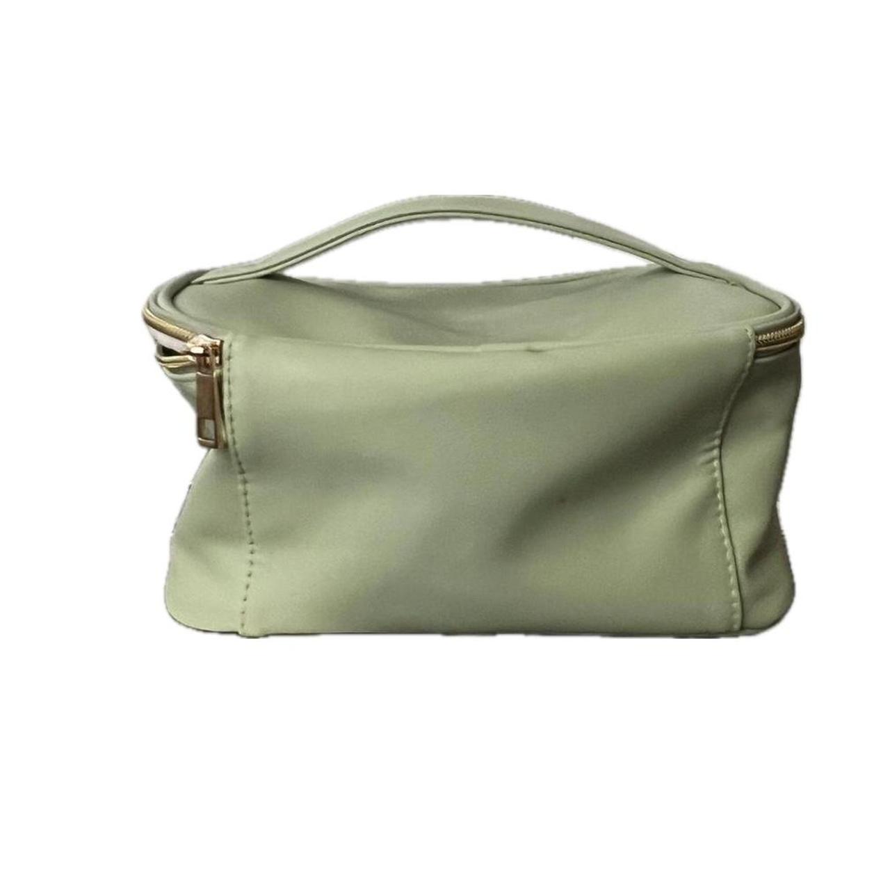 cute sage green makeup bag has some stains inside... Depop