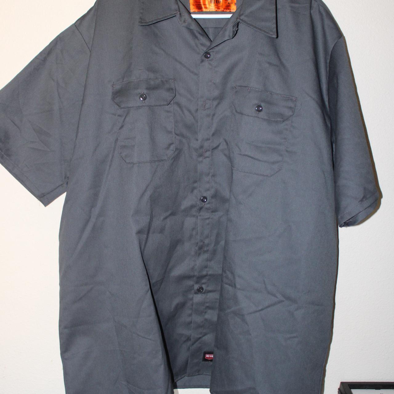 A work shirt with pocket flaps and left pocket... - Depop