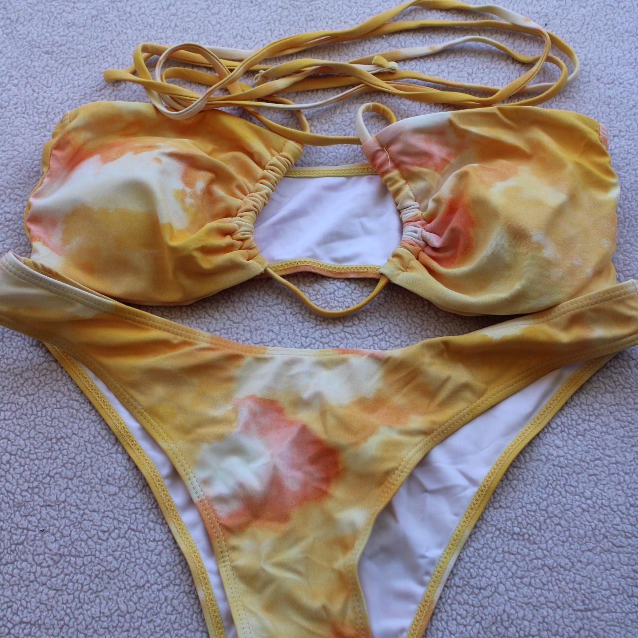Tie dyed orange and yellow threepiece bikini.... Depop