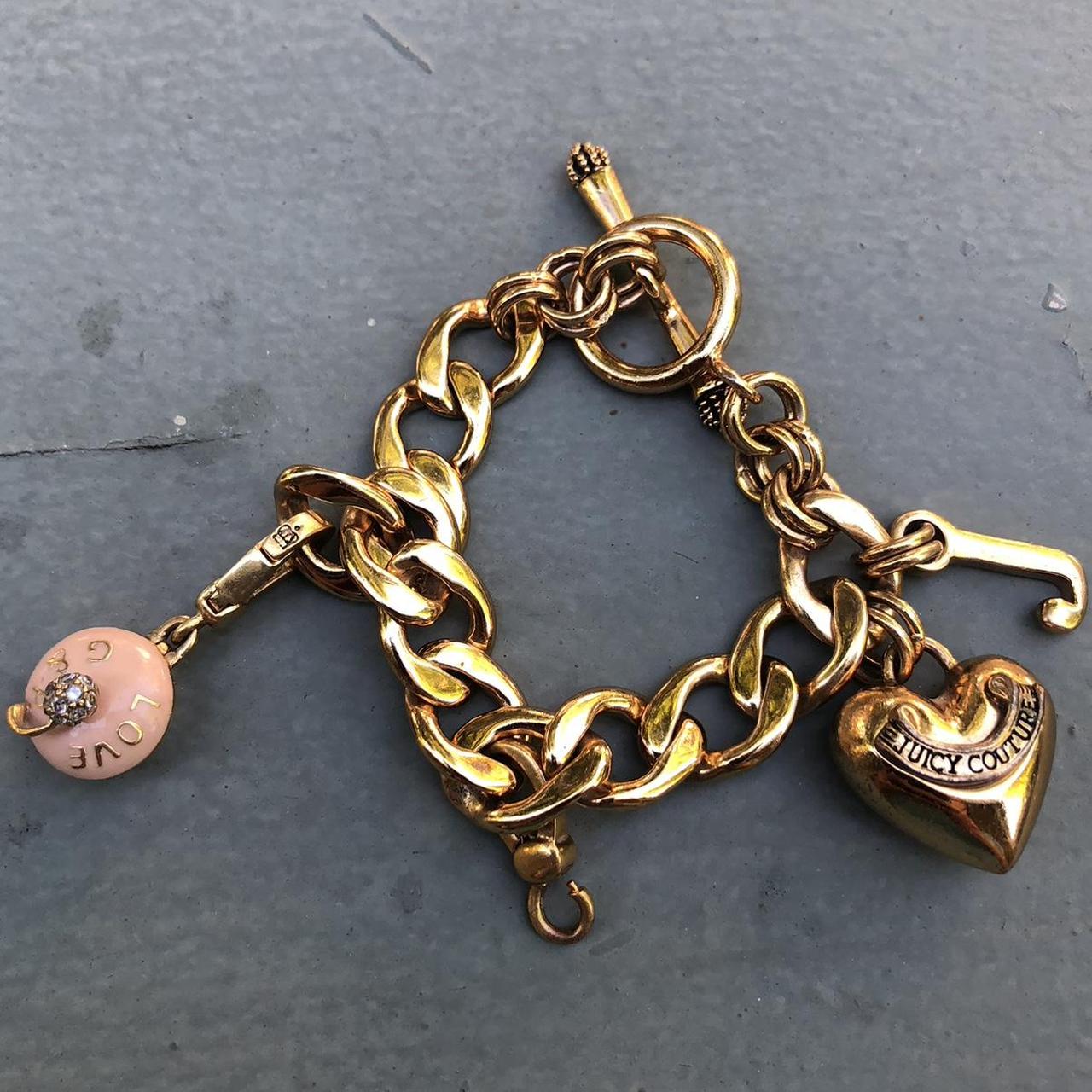 Juicy Couture Jewelry Gold charm bracelet with - Depop