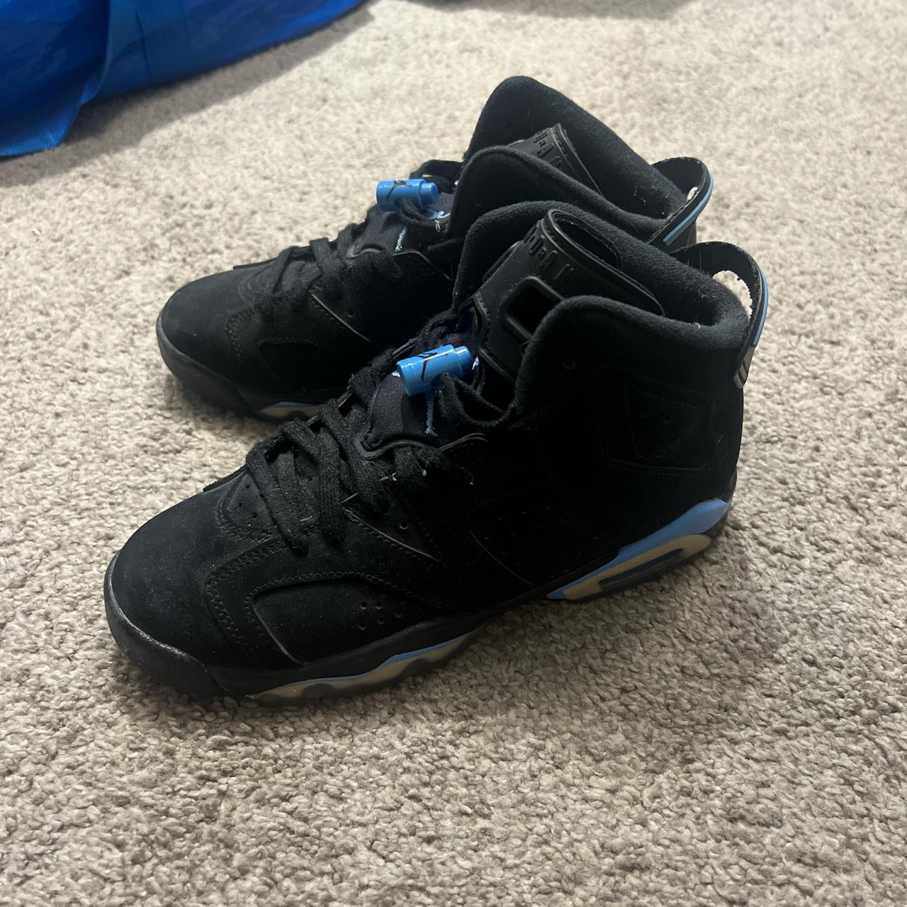dark blue and black jordans