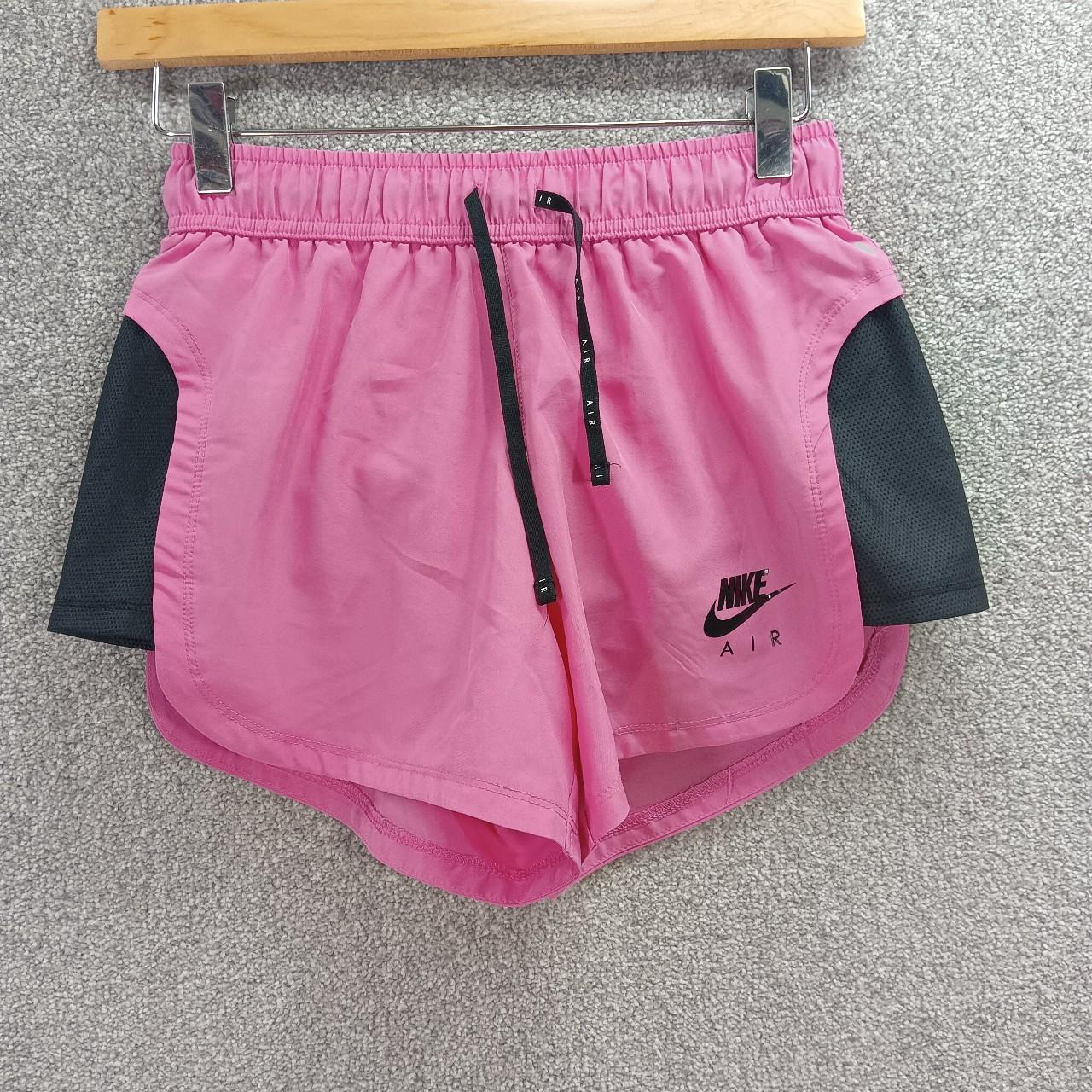 black and pink nike shorts