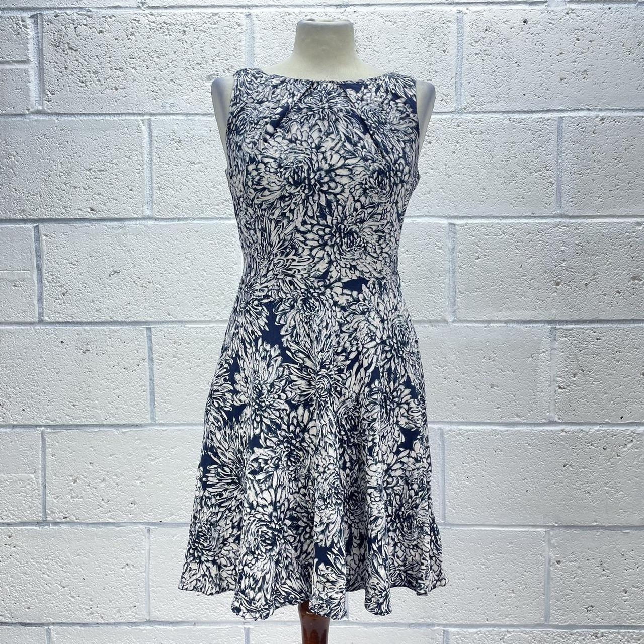 Apricot women’s sleeveless selling blue floral dress size 10