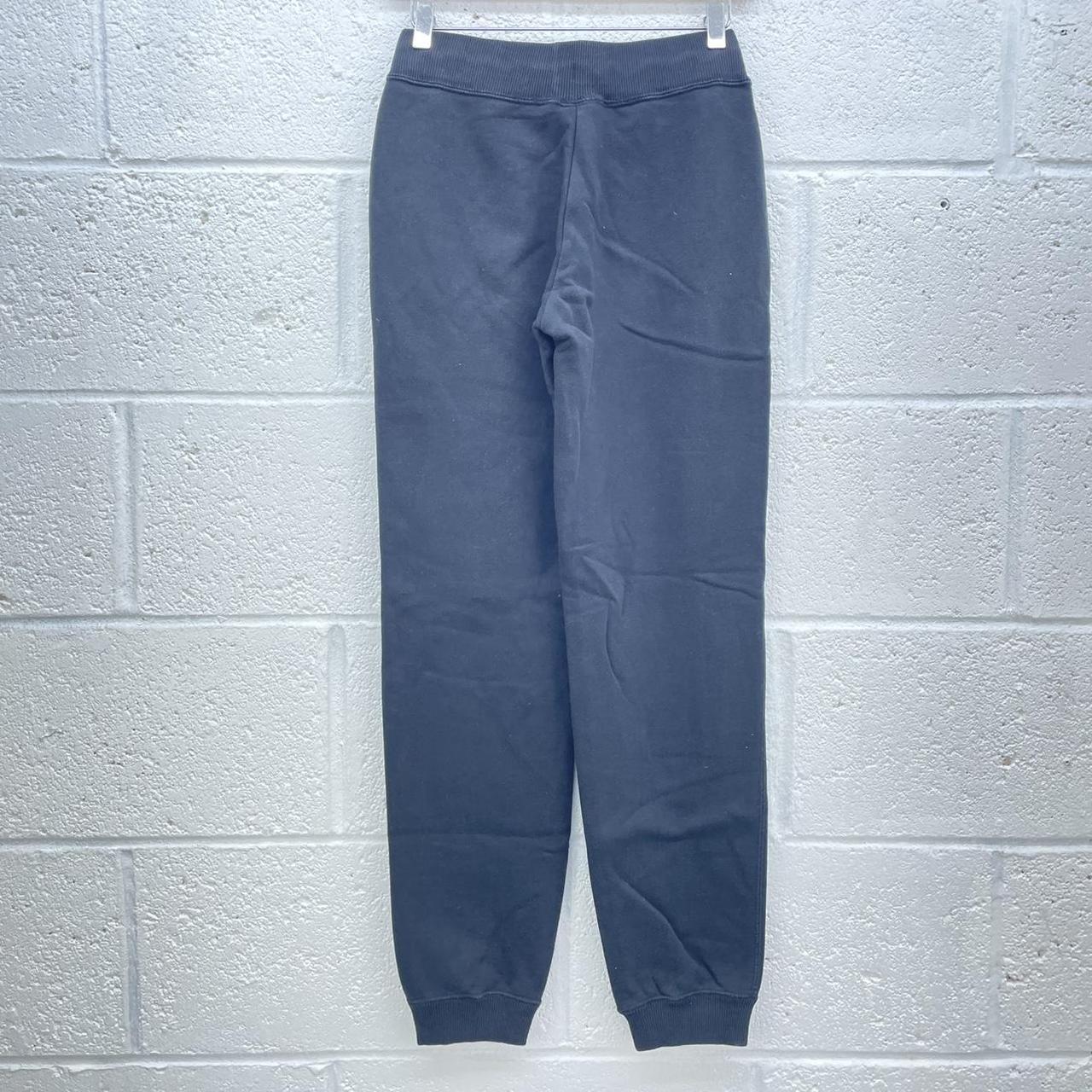 NIKE BLACK JOGGERS RETRO SWOOSH LOGO CUFFED... Depop