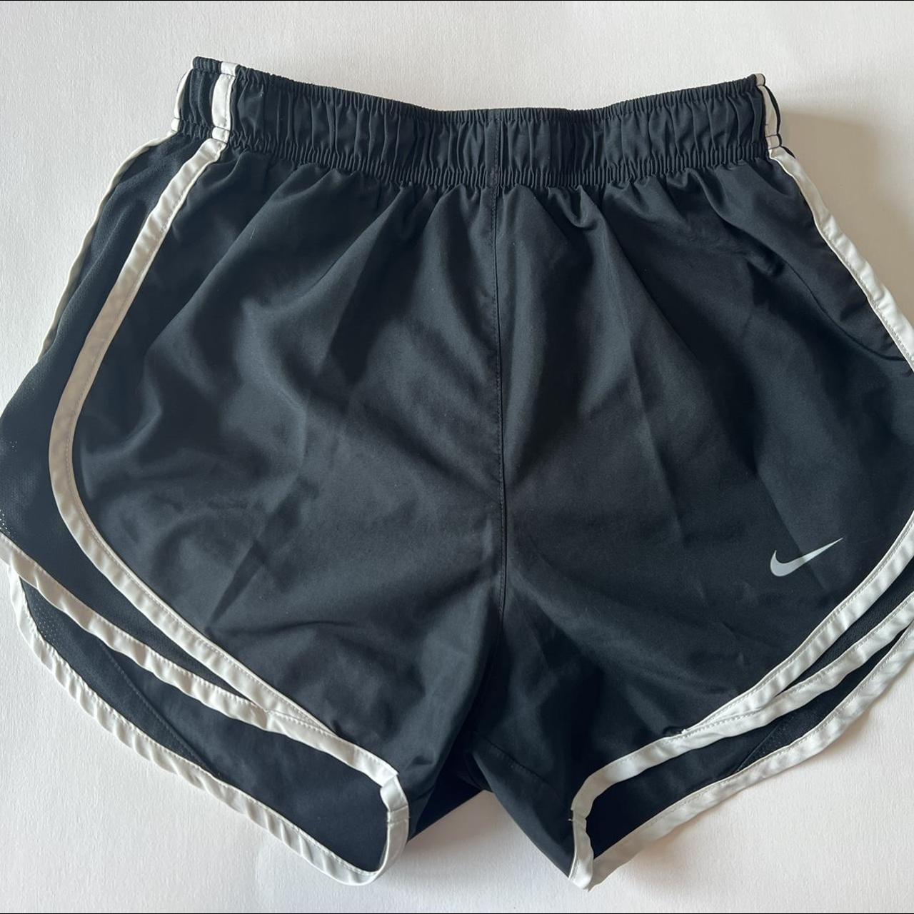 NIKE black short with white accents - Depop