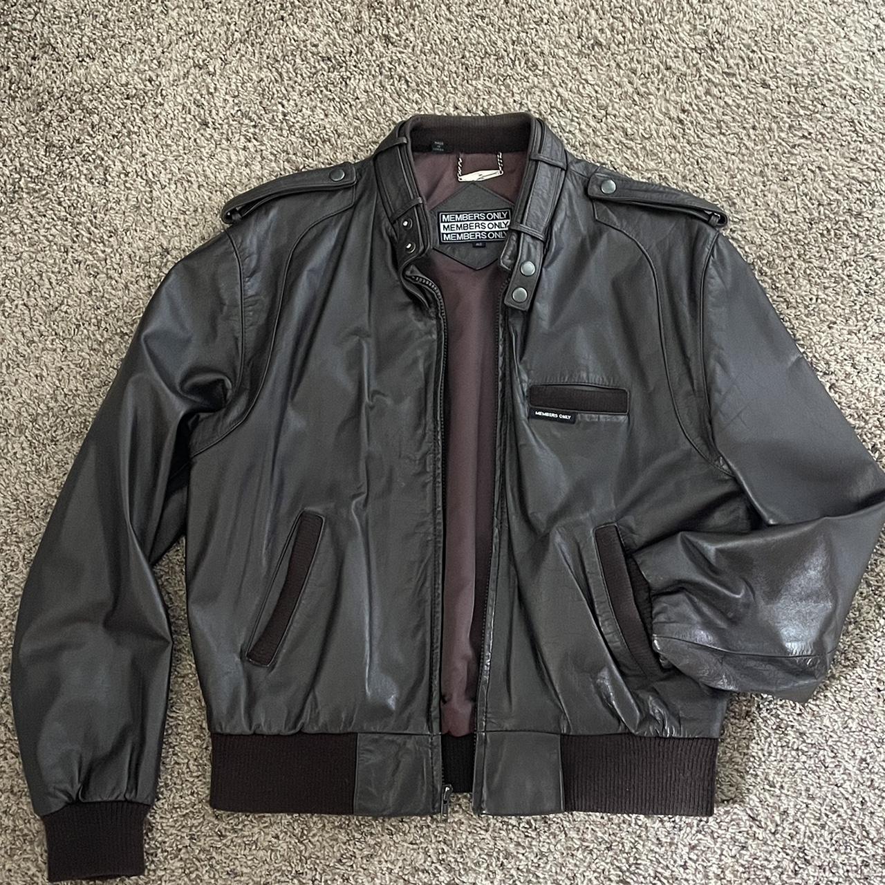 members only leather jacket. size 42. has two holes... - Depop