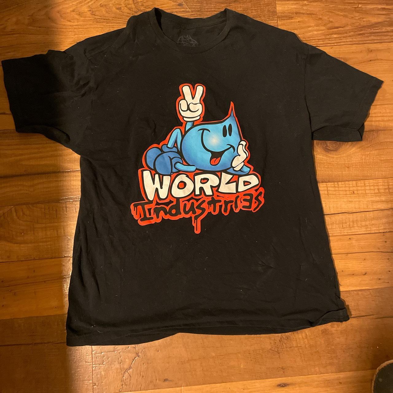 awesome black red and blue vintage “world... - Depop