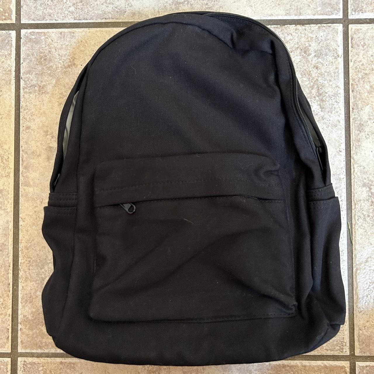 minimalist black backpack i’d say it’s not as big... - Depop