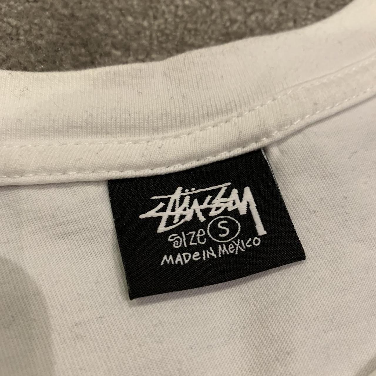 Stüssy Men's Black and White T-shirt | Depop