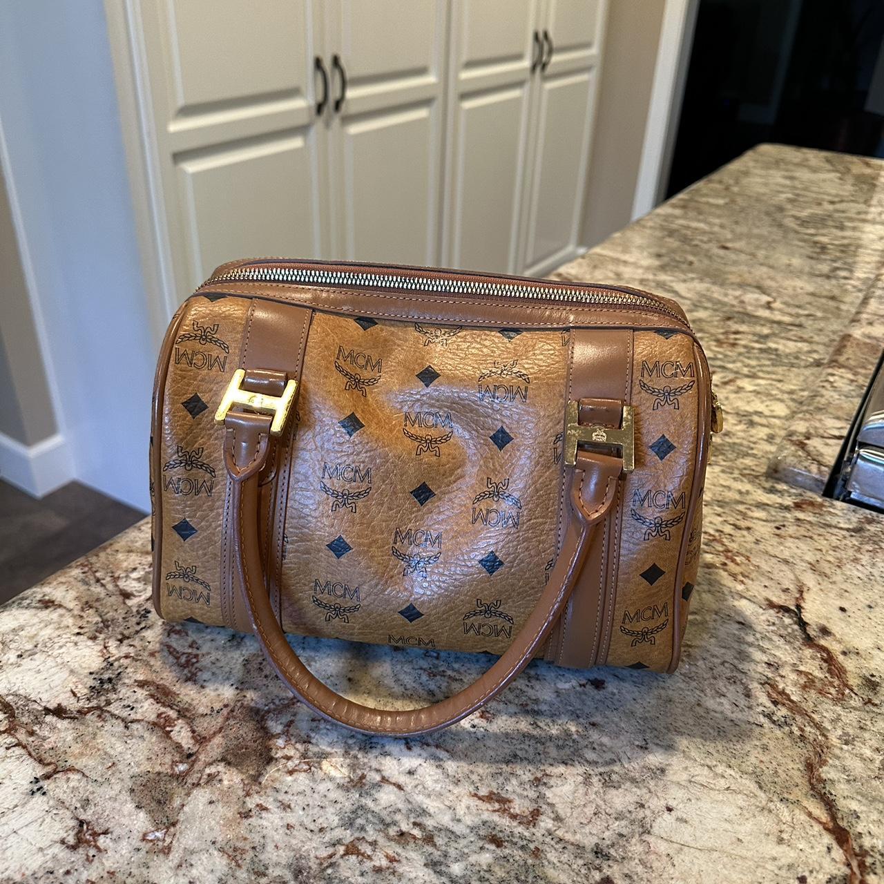 mcm bag barely used, perfect condition comes with - Depop