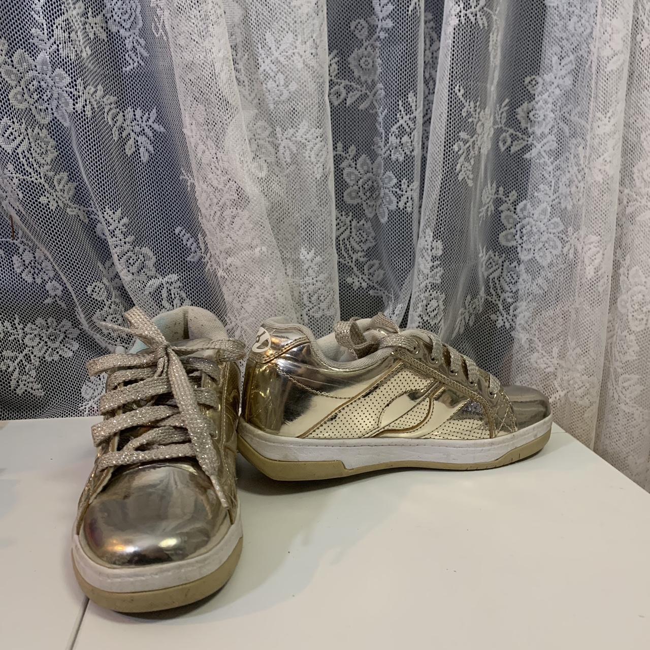 Gold heelys. - Depop