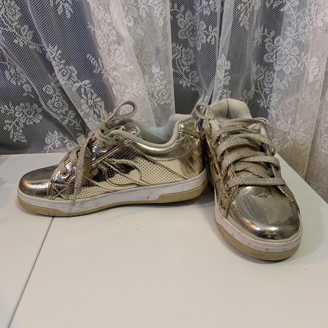 Gold heelys. - Depop