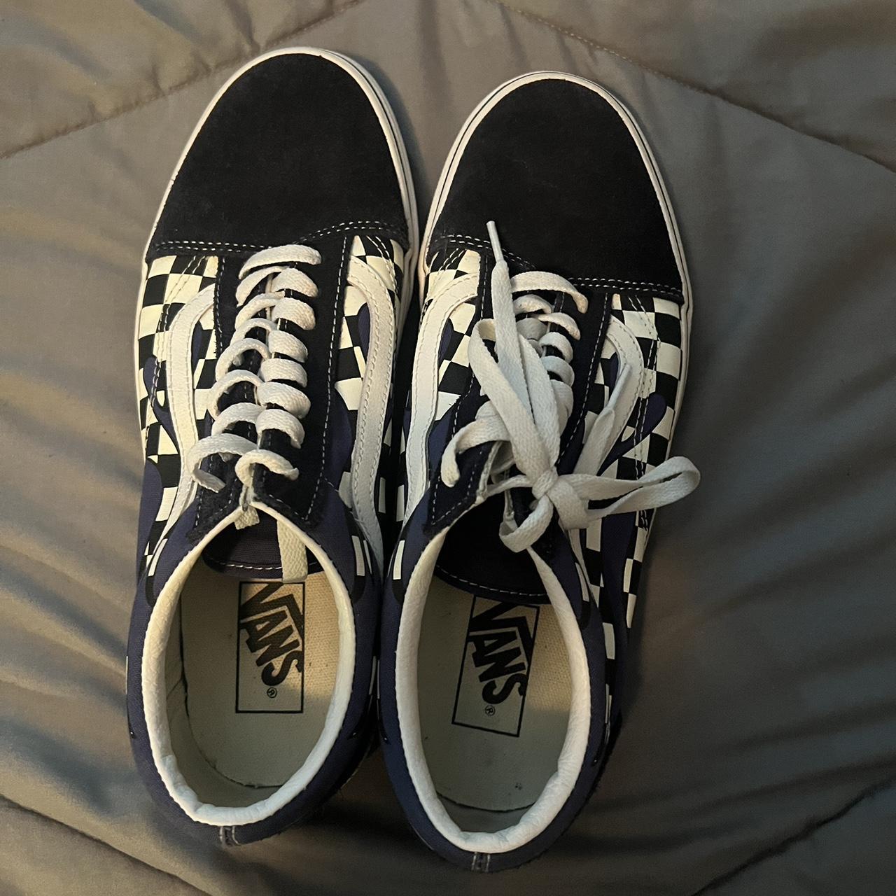 Checkered vans store with blue drip