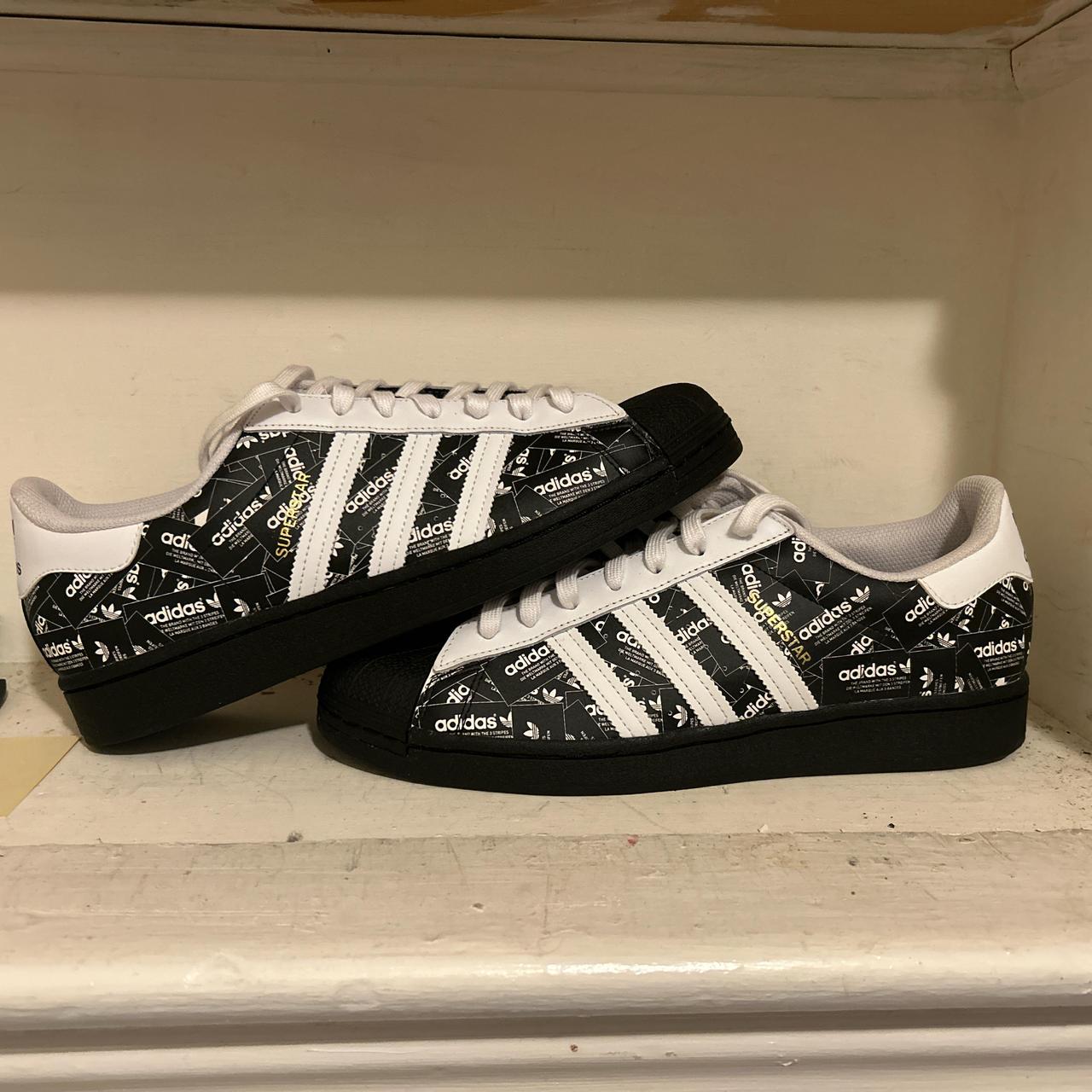 Adidas black and white superstars Size 11 Worn 4 times - Depop