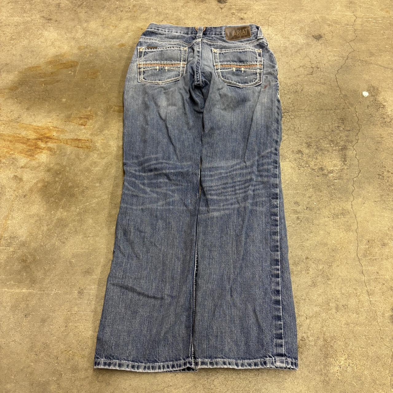 baggy wide leg Ariat jeans, medium denim wash size... - Depop