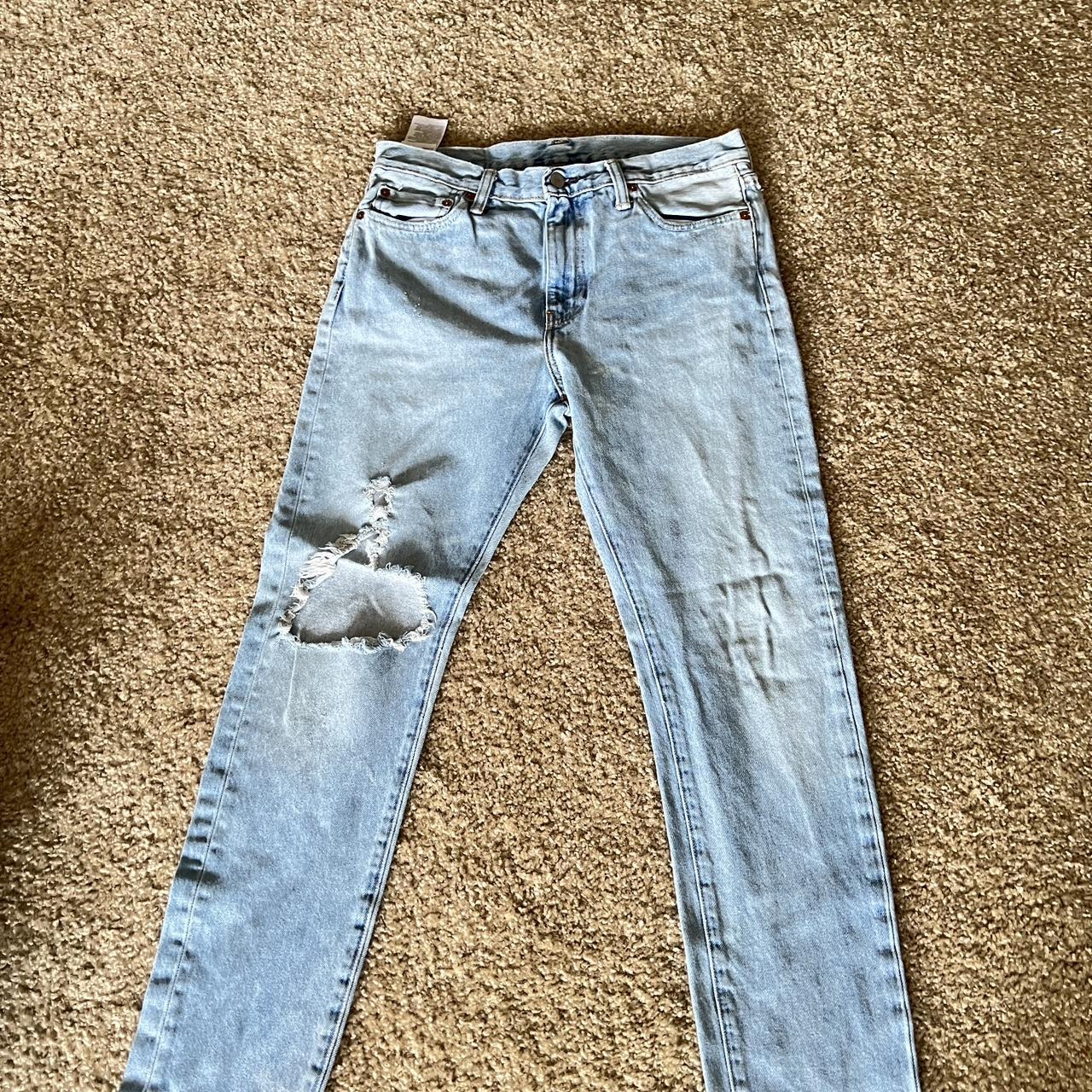 Light washed light blue Levi jeans Distressed from... - Depop