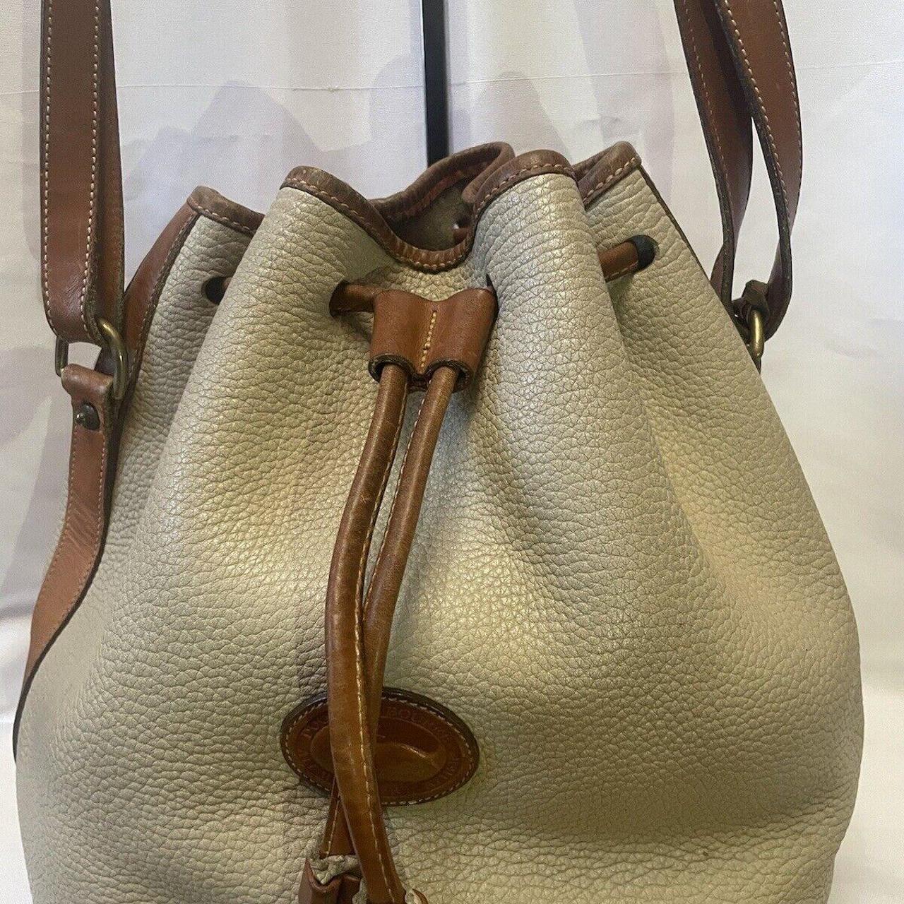 Store Dooney Bourke cream pebble leather bag