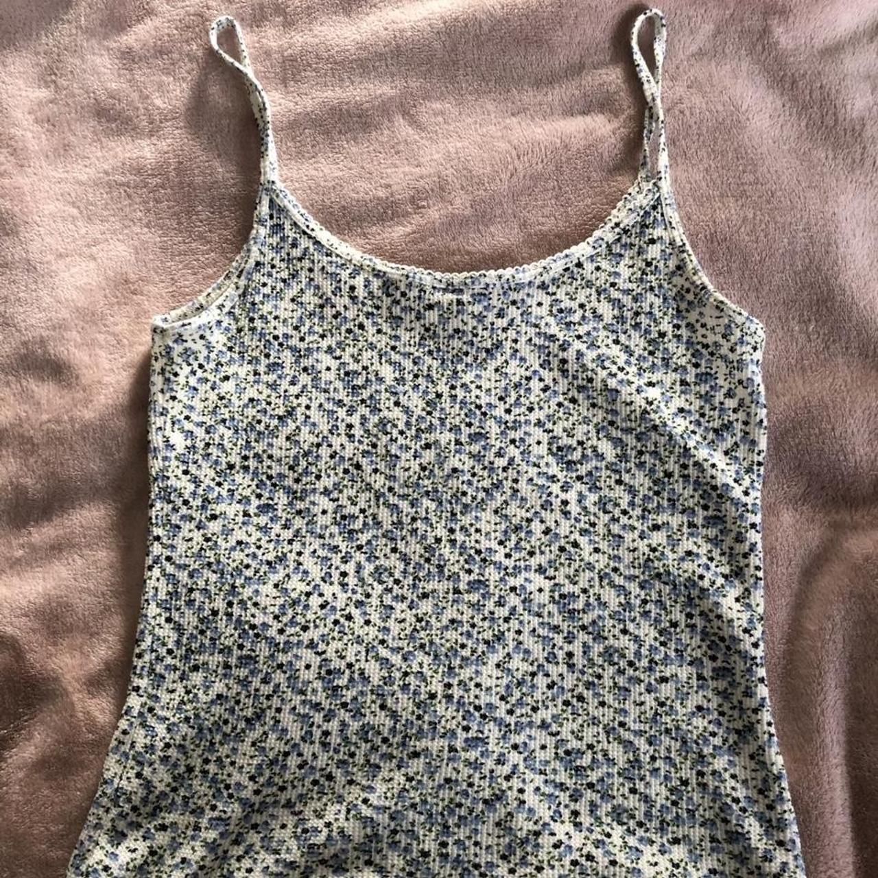 brandy melville blue floral tank top, so comfy and... Depop