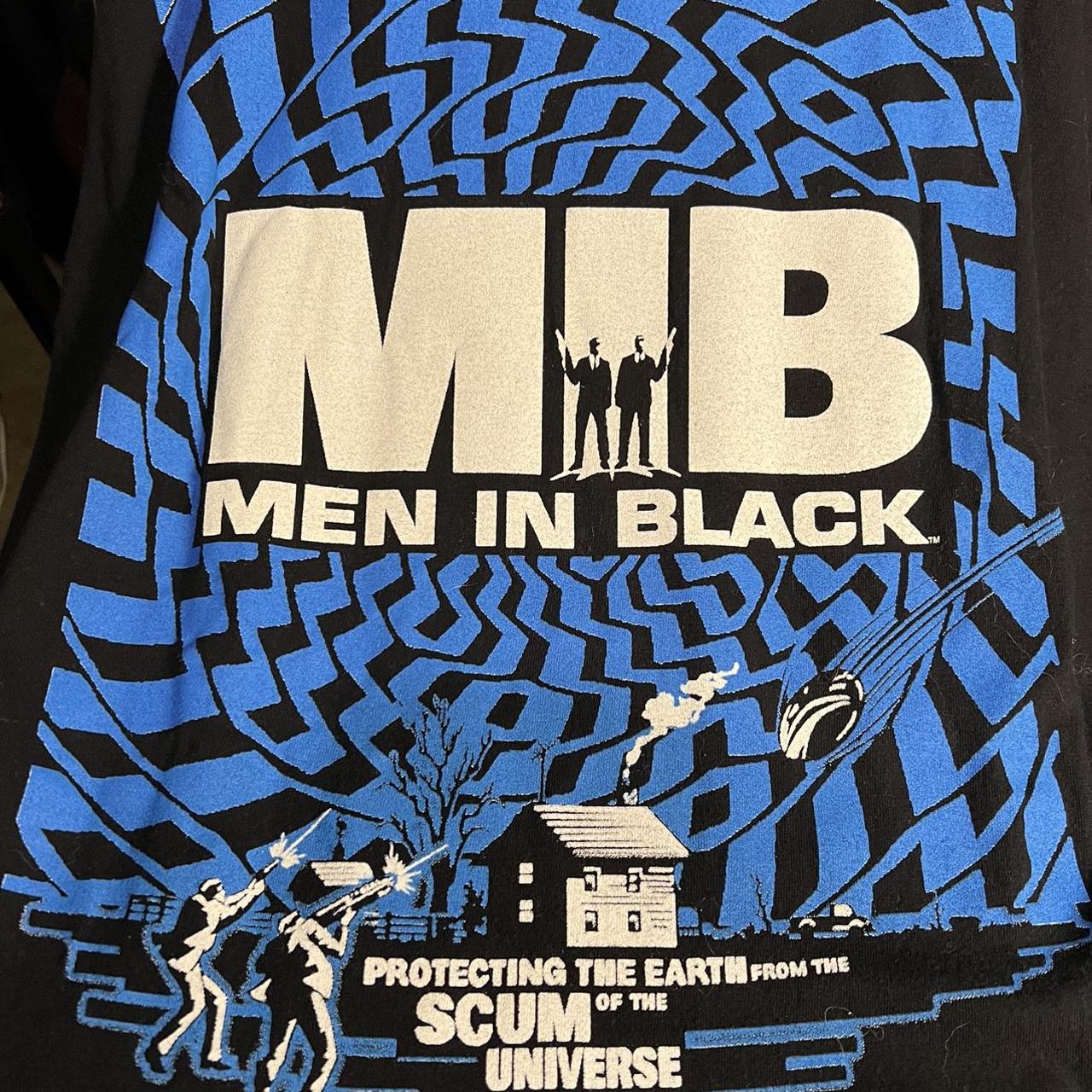 Vintage 90’s Giant Men deals in Black MIB Protecting Earth Movie Promo Shirt Sz XL