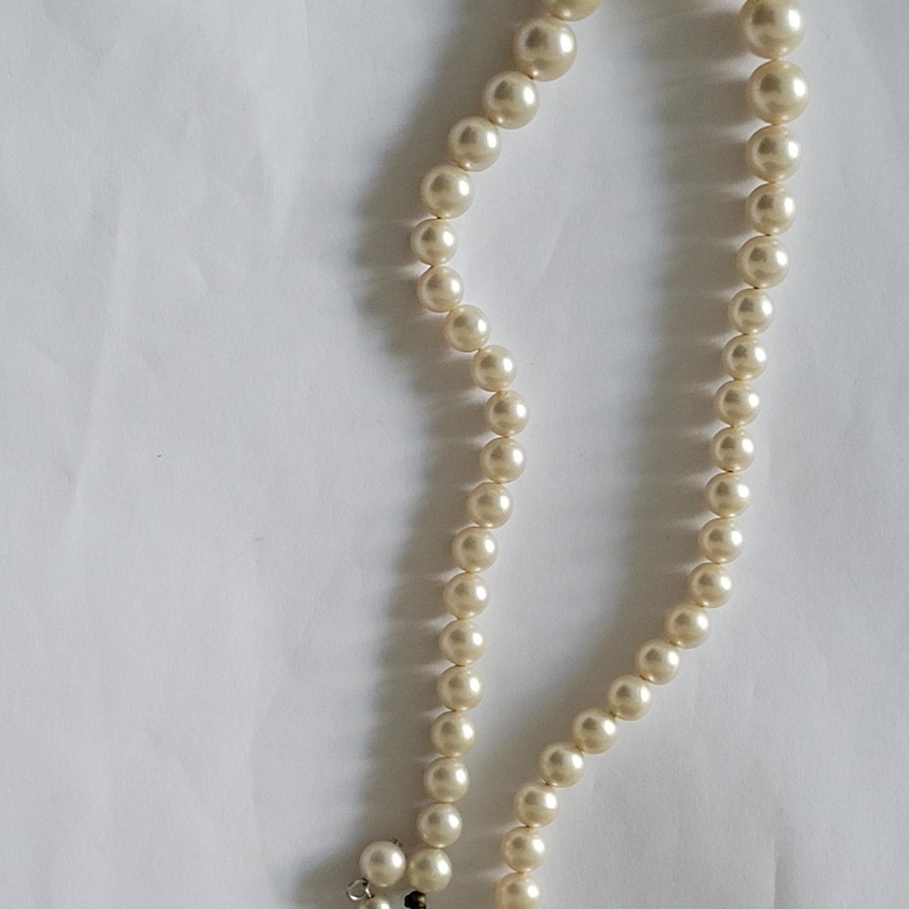 Japan stamped single strand graduated plastic pearl... - Depop