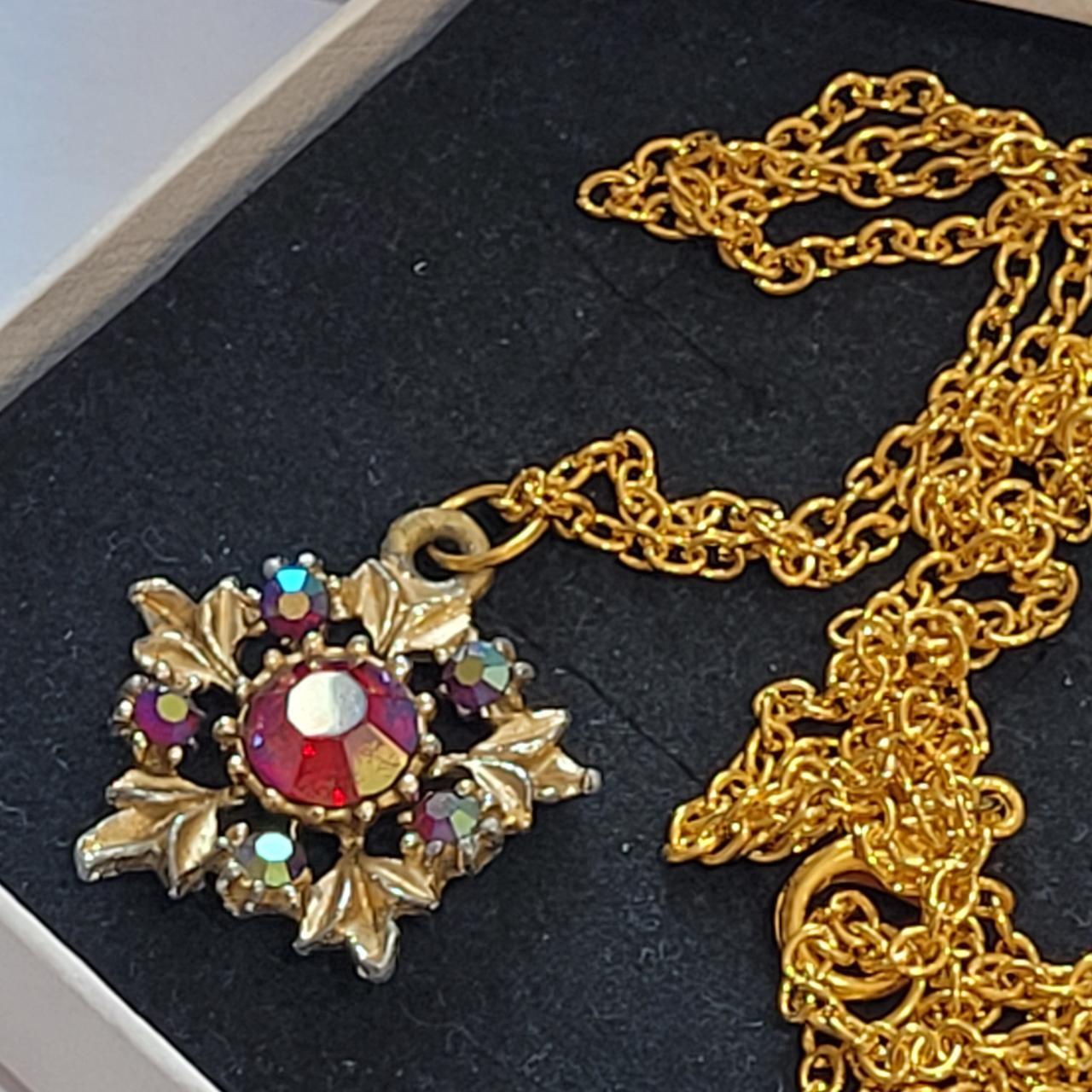 Stunning gemstone studded pendant and gold tone... - Depop