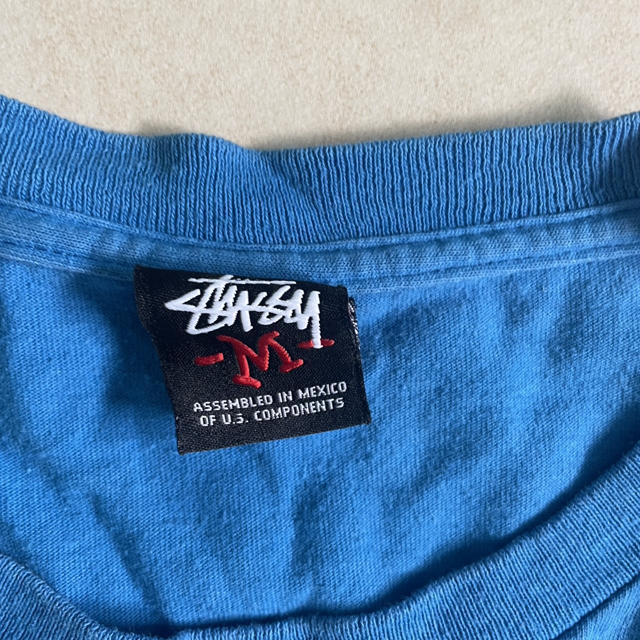 STUSSY T SHIRT - Lighter shade of blue with classic... - Depop