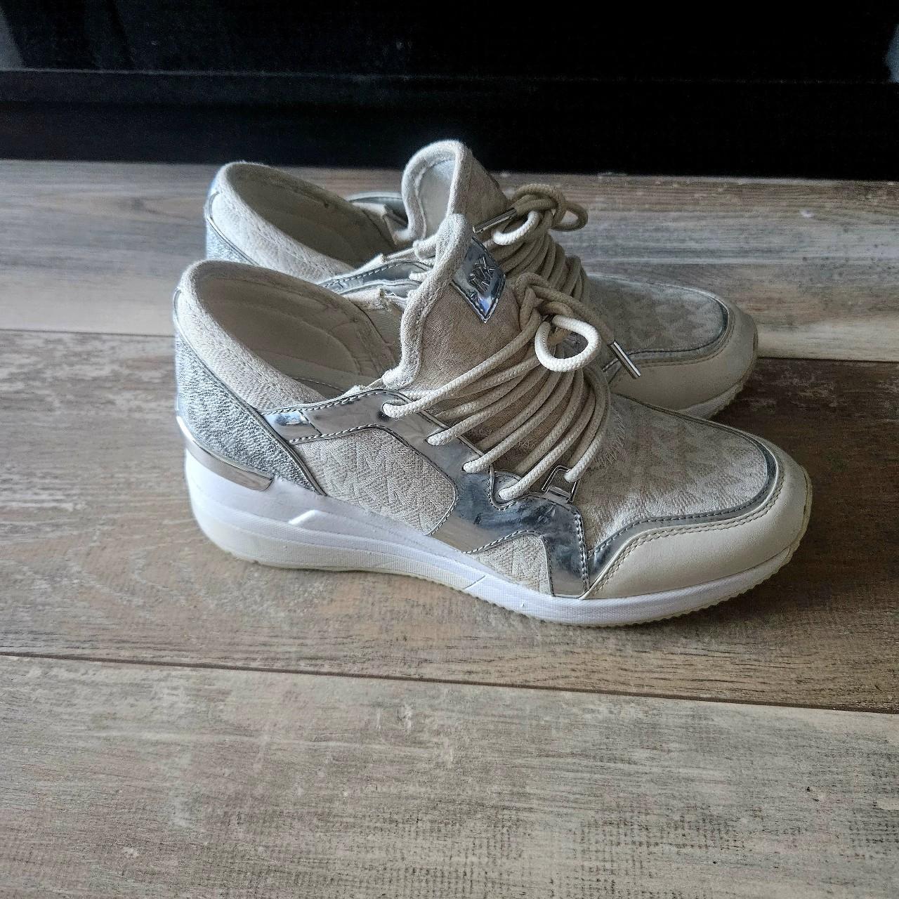 Michael kors hot sale wedge trainer