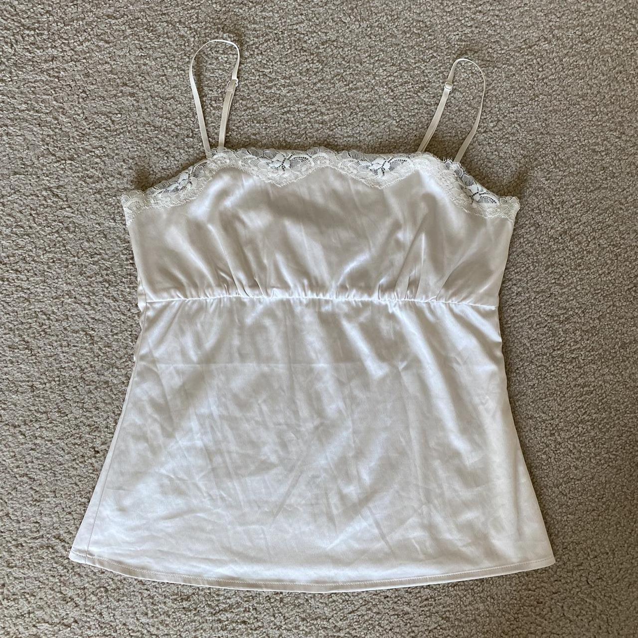cream lace tank top with a relaxed fit! would look... Depop