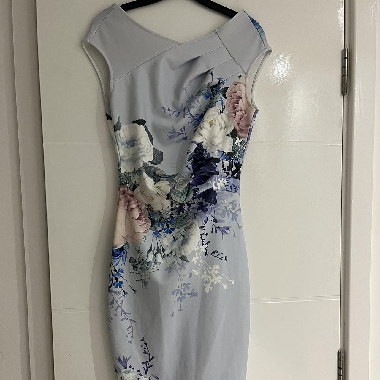 Lipsy blue floral dress. Slightly ruched neck with