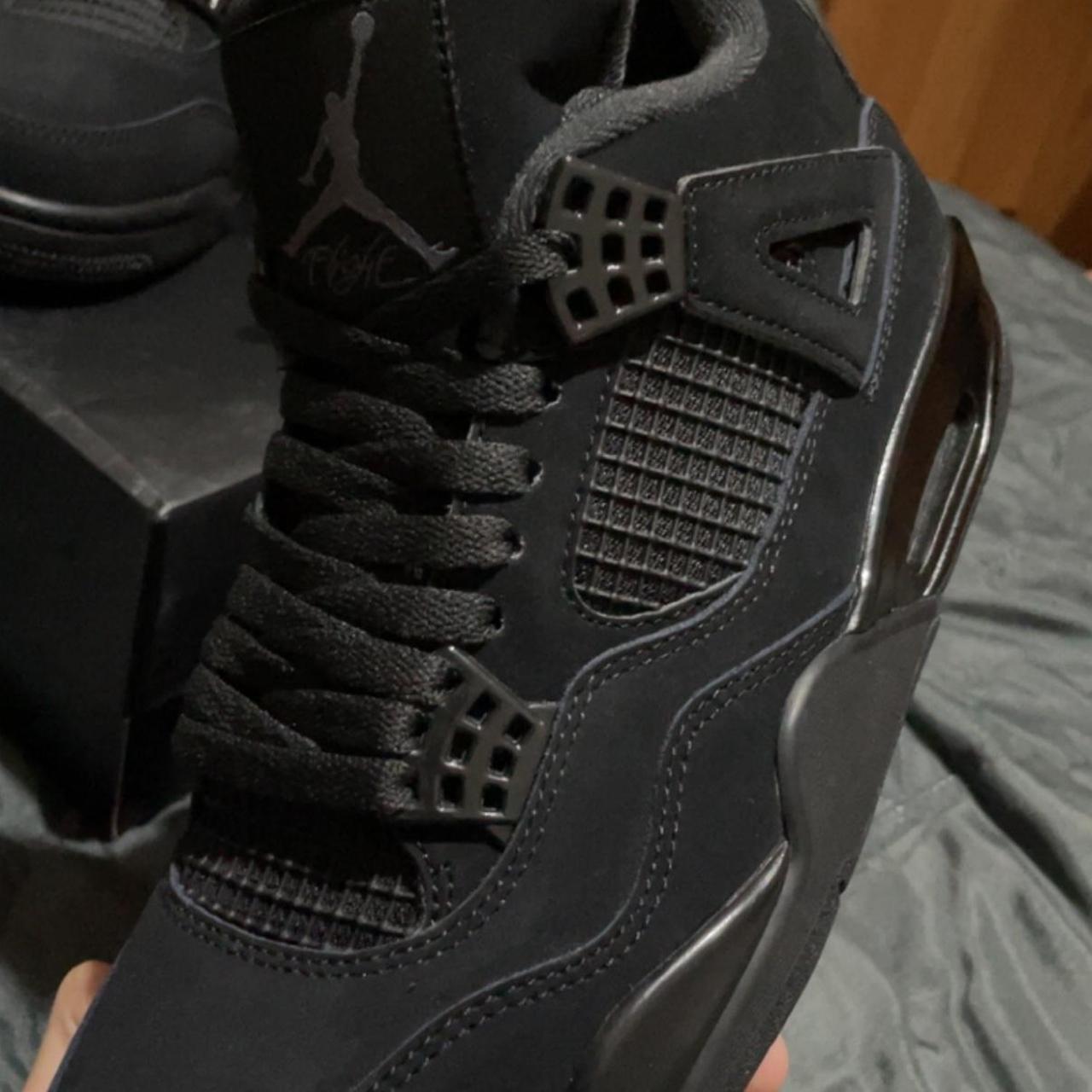 Jordan 4s black cats wore once too big selling... - Depop