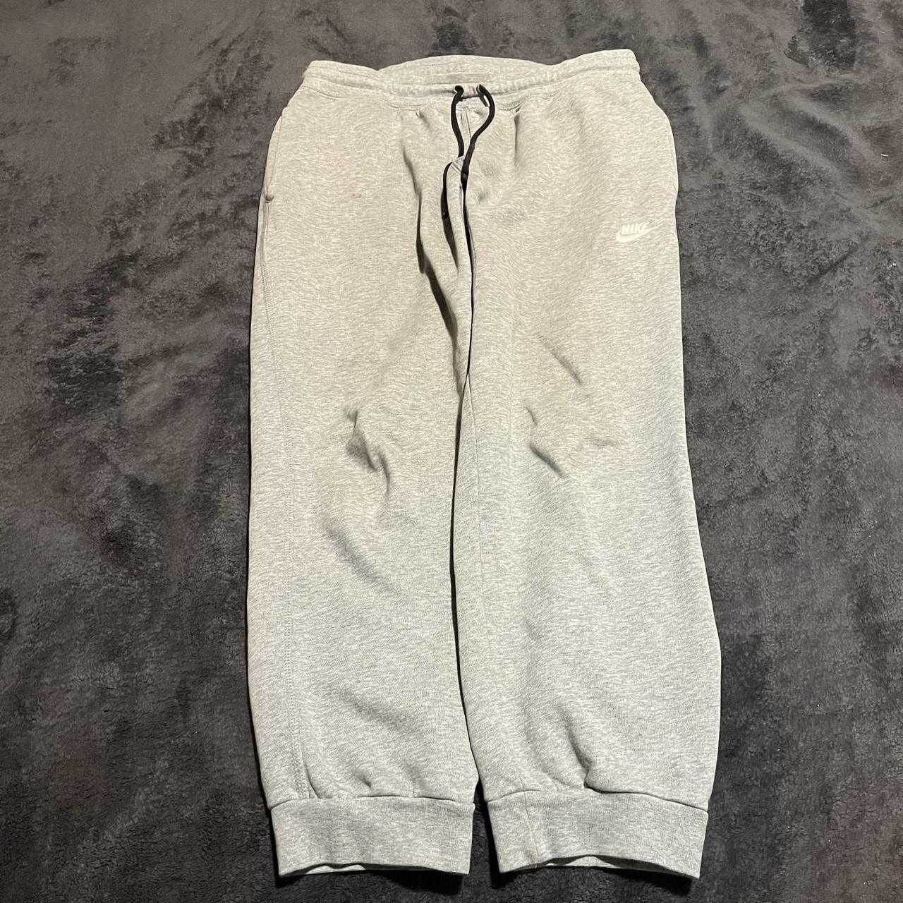 Nike Open leg sweats Size Large Small flaws on... - Depop