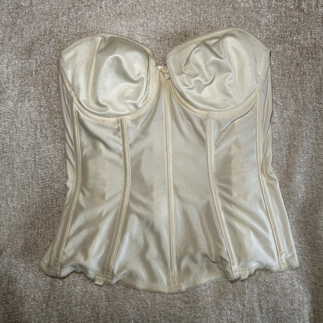 Silk creamy white corset top is sewn to fit smaller... - Depop