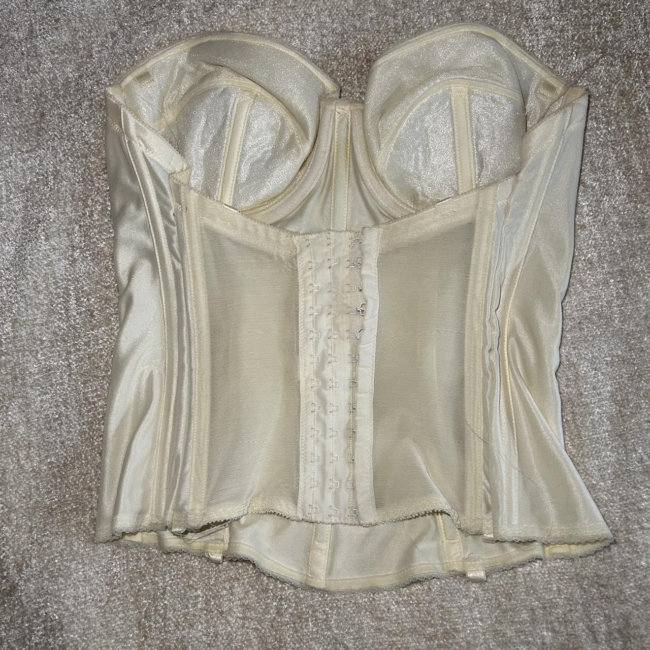 Silk creamy white corset top is sewn to fit smaller... - Depop