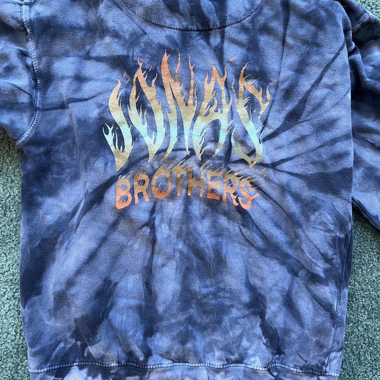 Jonas Brothers blue tie dye hoodie well worn with