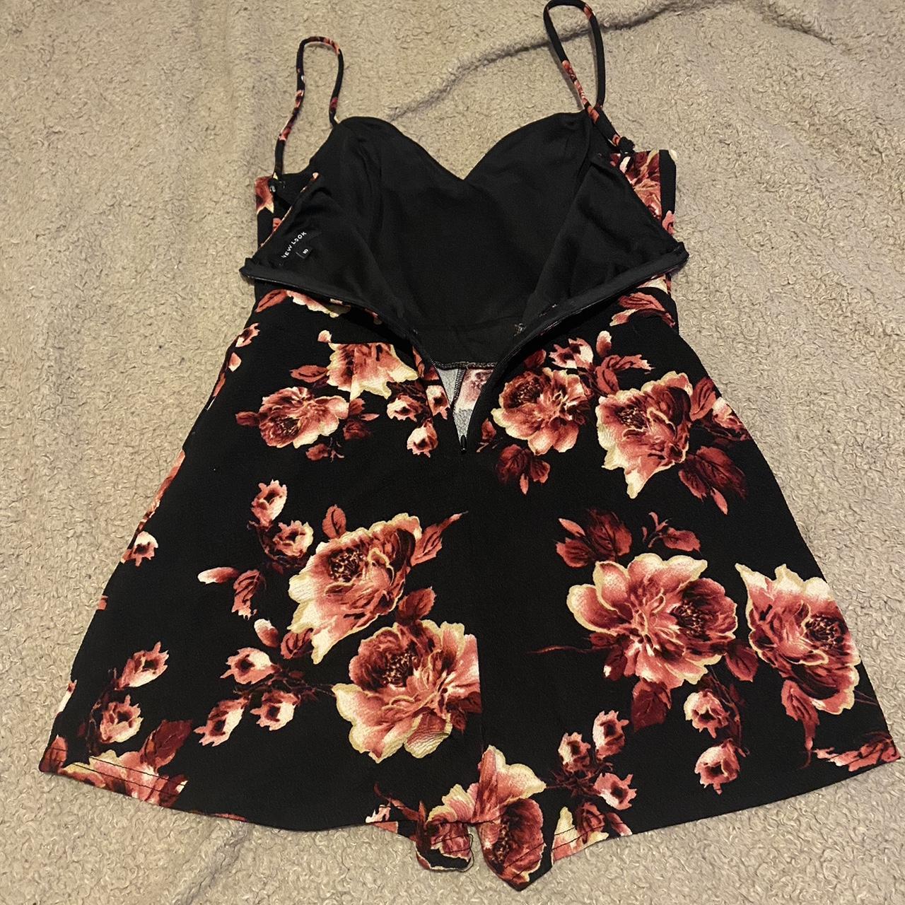 Black play suit with pink flower pattern. Thin... - Depop