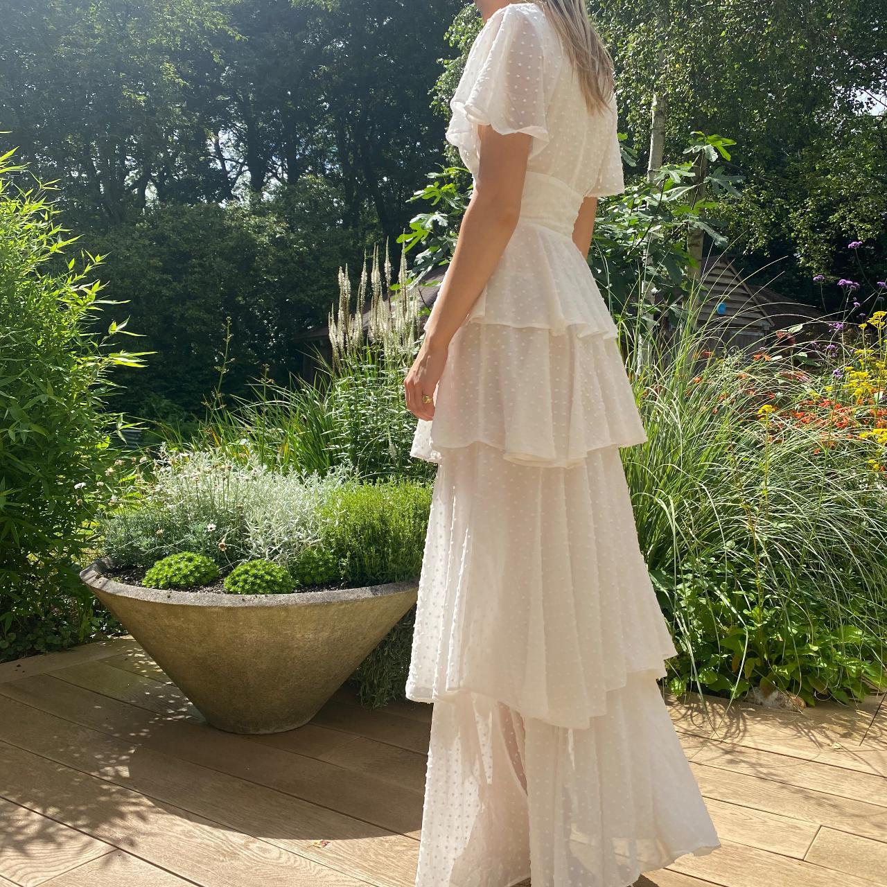 Stunning white tiered maxi dress with ruffled, v... - Depop