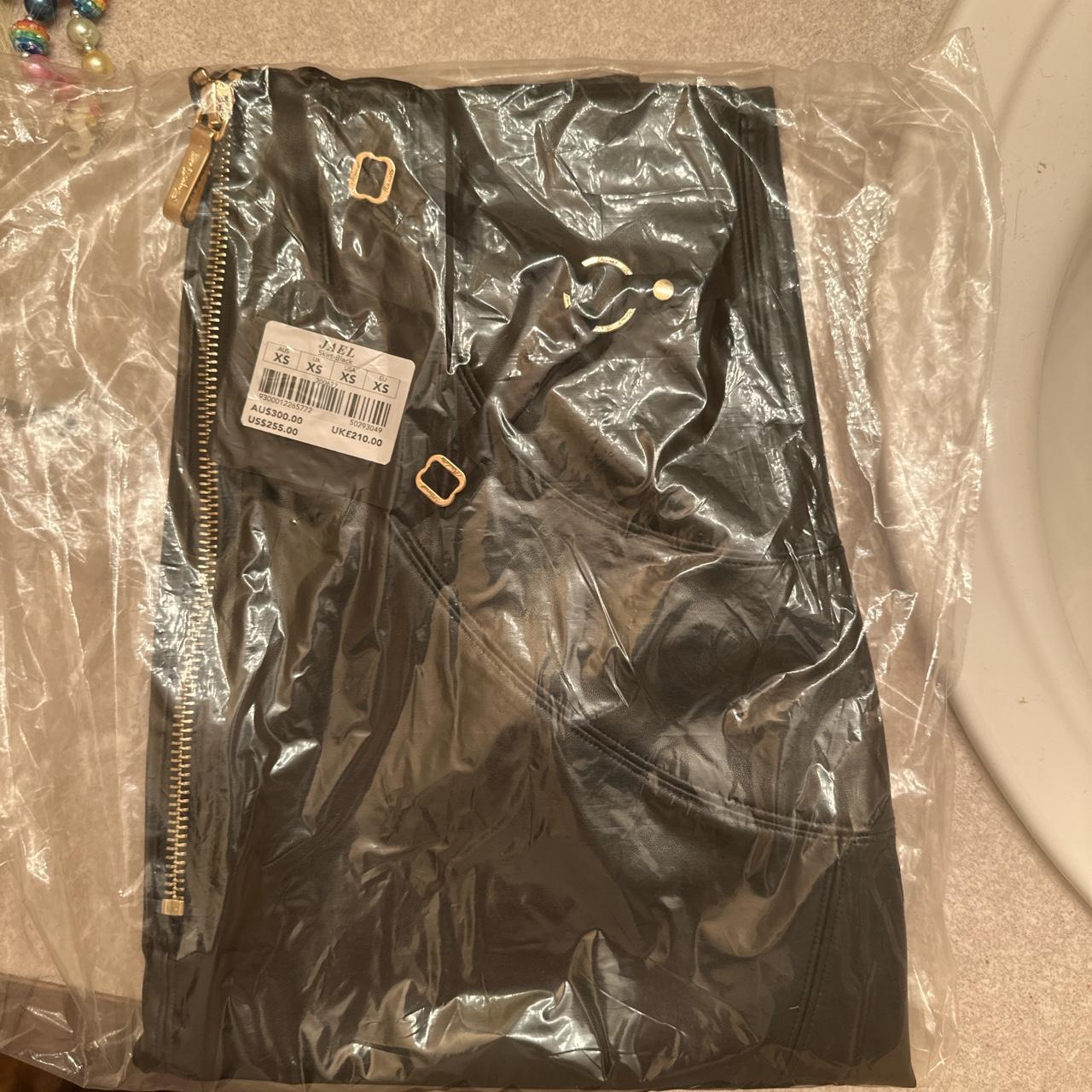 Never been opened Jael XS skirt from Honey Birdette.... - Depop