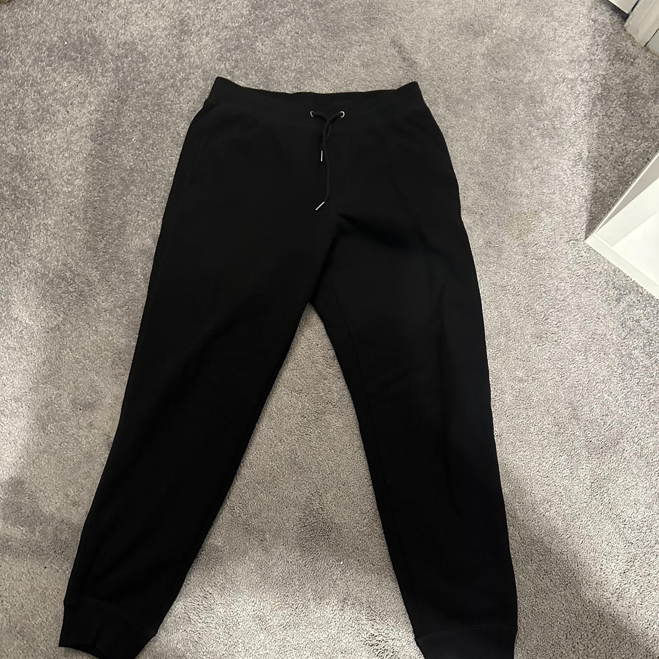 Uniqlo men's lightweight heattech pants in black. - Depop