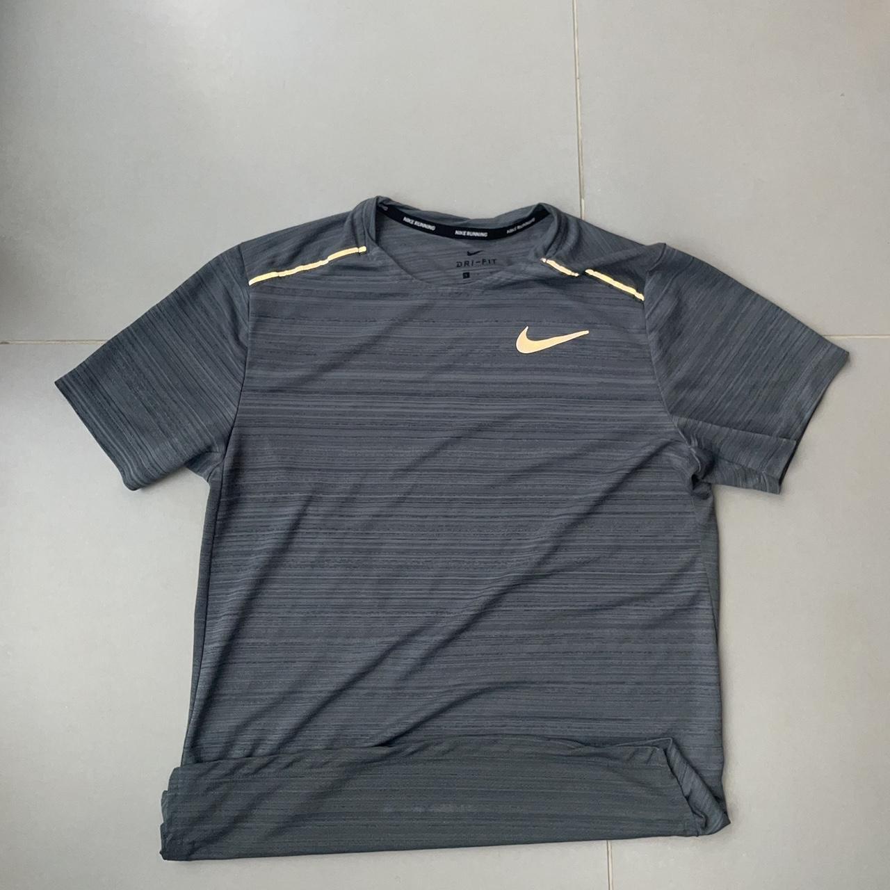 Grey Nike Miler / miller running Dri fit drifit... - Depop