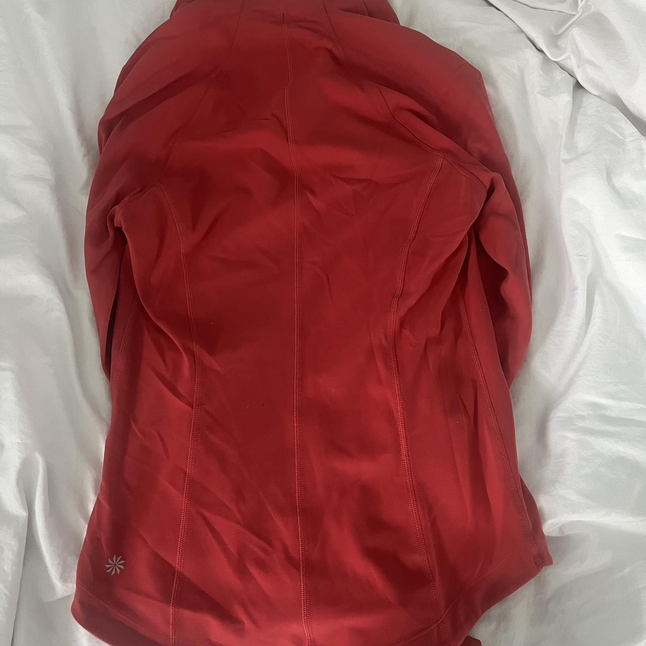 athleta jacket! its is red and fits tight like a... Depop